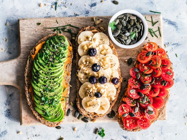 Gluten-free - assorted fruits and vegetable on brown wooden chopping board