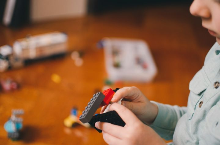 Indoor Play - toddler's playing building block toys