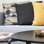 Home Decor - Centerpiece on Coffee Table Beside Sofa With Three Pillows