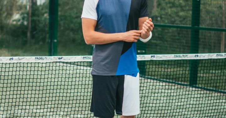 Sportswear - Man Wearing Blue and White Crew-neck Shirt and Shorts