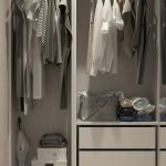 Wardrobe - Assorted Clothes Hanged Inside Cabinet